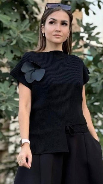 Bize Asymmetrical Knit Top with Flower Accent